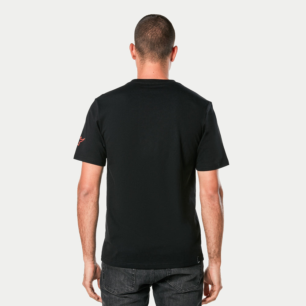 Alpinestars Linear Wordmark 2.0 CSF Tee, Black, back view of a person wearing the short-sleeve T-shirt, featuring a red Ageless logo on the sleeve, casual motorsport streetwear.