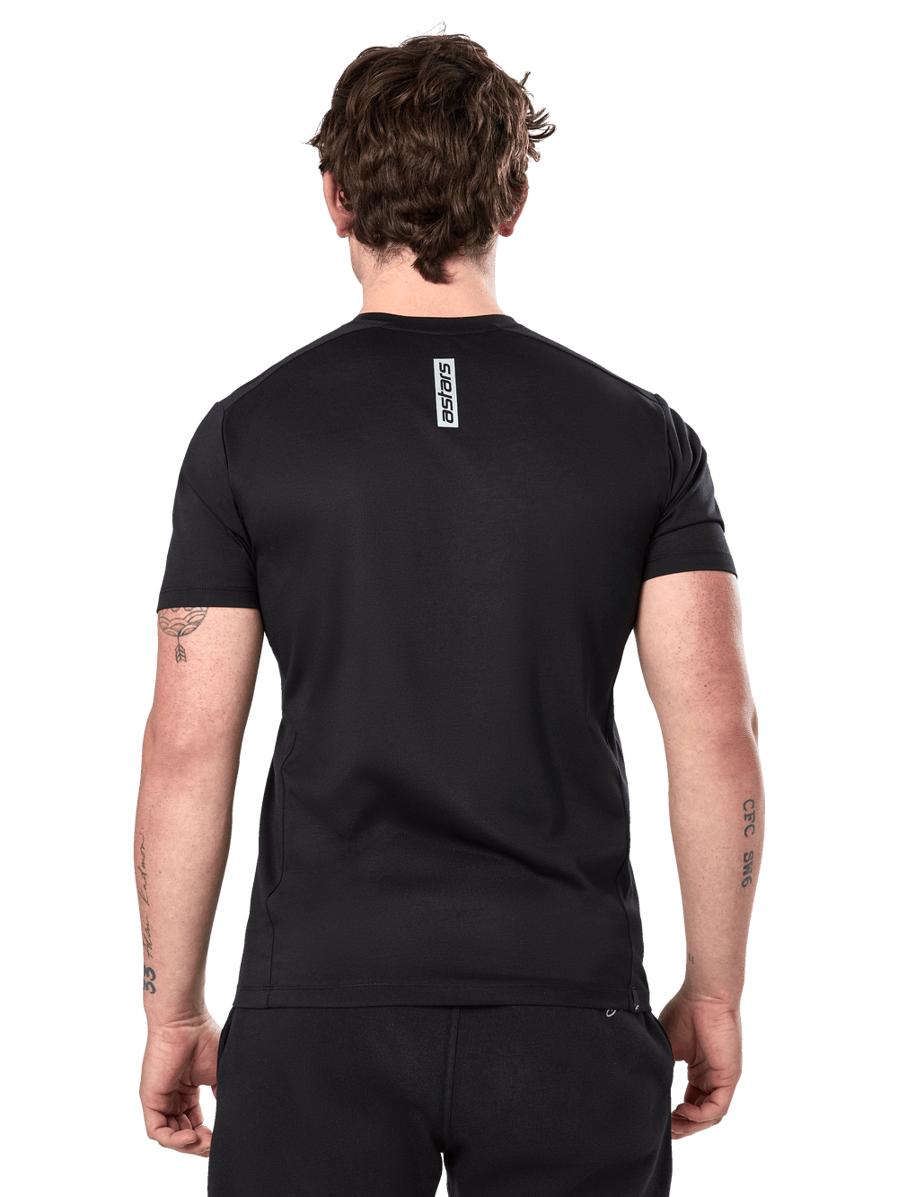 Alpinestars Point Performance Tee, Short Sleeve T-Shirt, Black, rear view on a man featuring a vertical astars word print on the upper back, casual performance sportswear