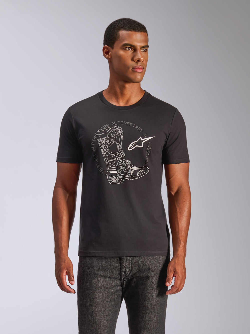 Alpinestars Tech Boot CSF T-Shirt, Black Cotton Tee with White Motocross Boot and Star Logo, worn by model, Sportswear