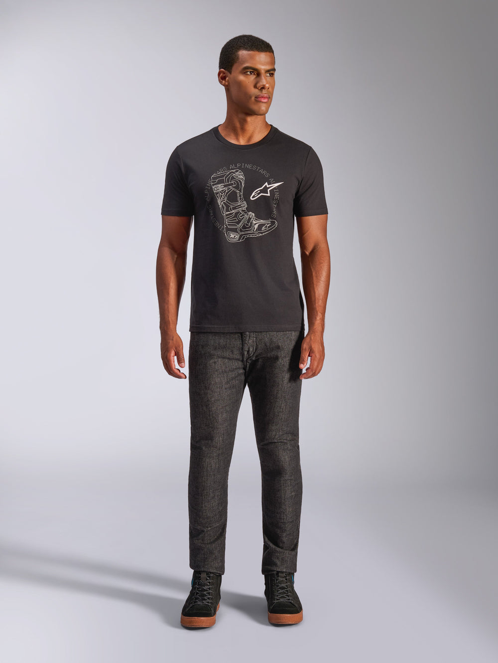 Alpinestars Tech Boot CSF T-Shirt, black short-sleeve sportswear tee with white motocross boot graphic on model.