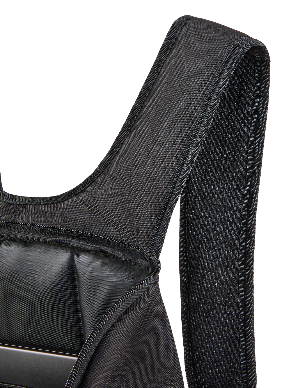 Alpinestars Defcon V3 Backpack, close-up of the padded air mesh shoulder strap and open main compartment, black 600D polyester, showing internal laptop sleeve and durable textile construction.