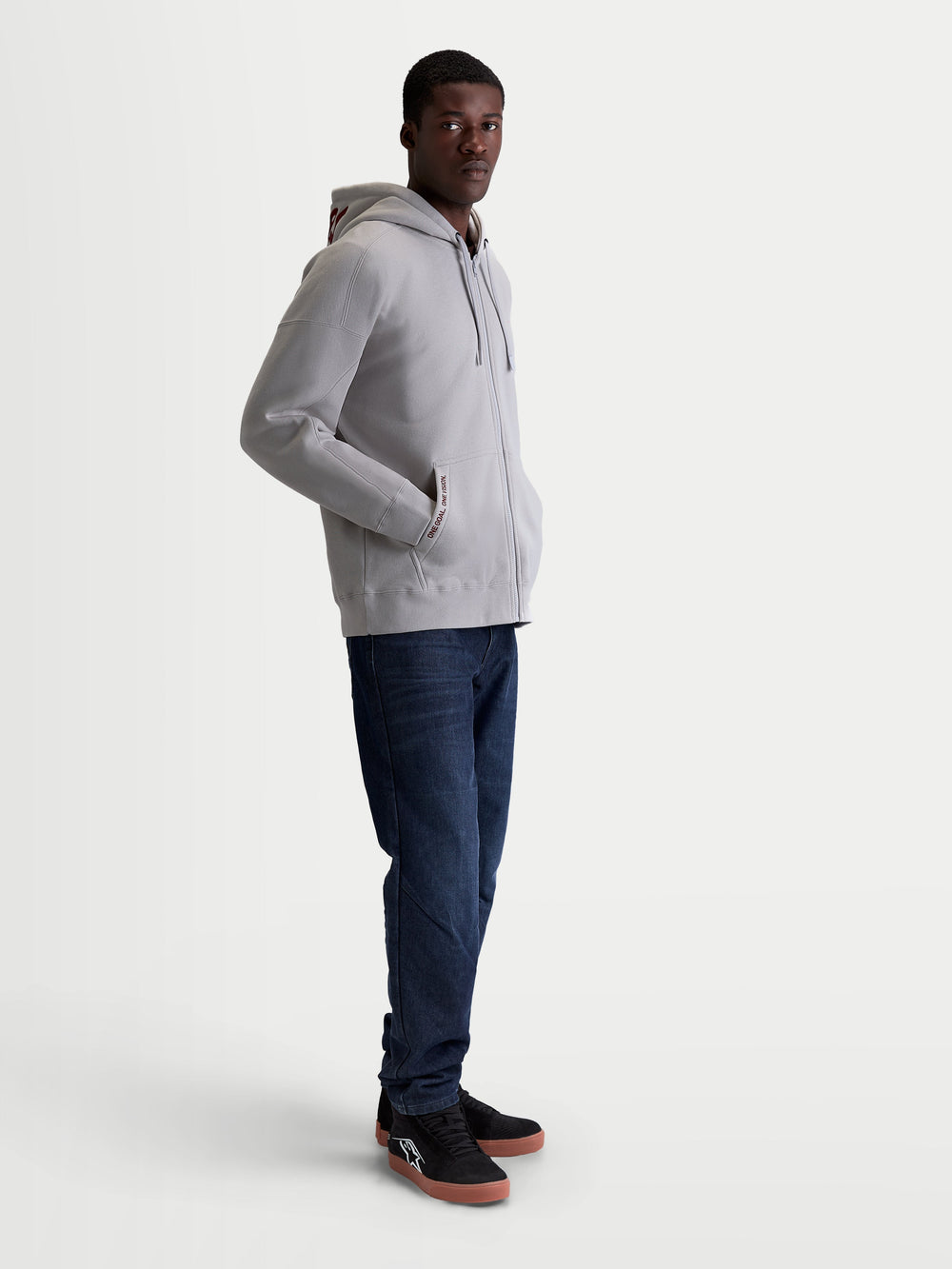 Alpinestars Pioneer Oversized Hoodie, Men's Sportswear Zip Fleece in Cement Gray, featuring an oversized fit, Vislon front zipper, kangaroo pocket with embroidery, and self-lined hood, cotton and recycled polyester blend.