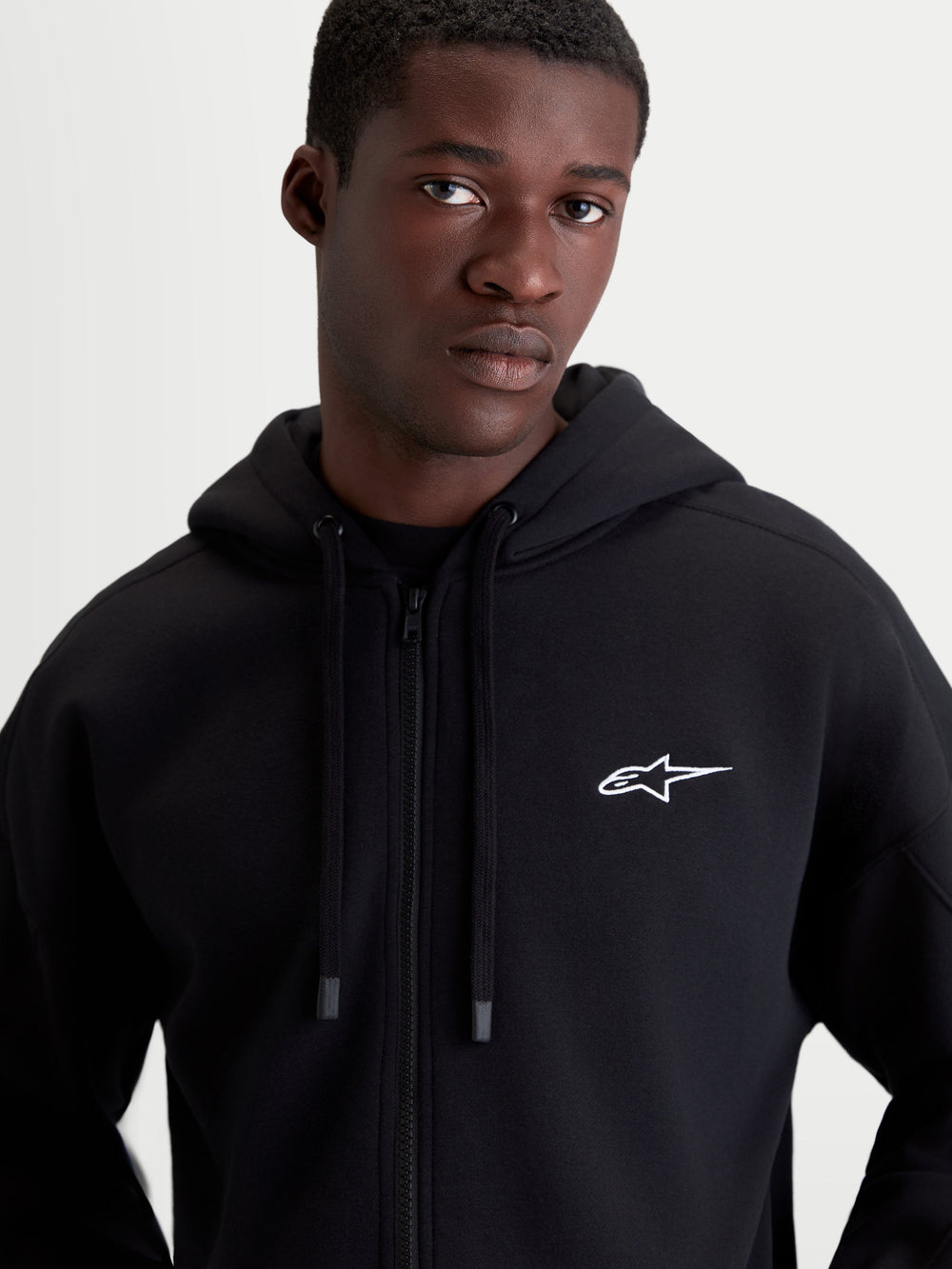 Alpinestars Entity Oversized Hoodie, Men's Sportswear Zip Fleece, Black with White embroidered Astars logo, relaxed oversized fit, Vislon front zipper, self-lined hood with flat drawcords, premium cotton and recycled polyester blend fleece.