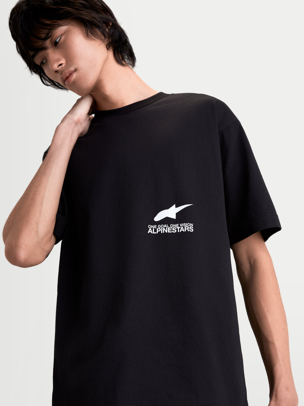 Alpinestars Institute Oversized CSF Tee, Men's Sportswear Short Sleeve T-Shirt in Black, featuring a white chest logo and One Goal One Vision graphic, relaxed oversized fit, soft combed cotton-poly blend construction.