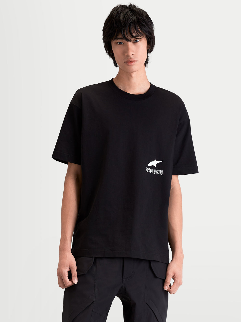 Alpinestars Institute Oversized CSF Tee, Men's Short Sleeve Sportswear T-Shirt, Black with small white logo graphic, relaxed oversized fit, premium cotton-poly blend, casual everyday wear.