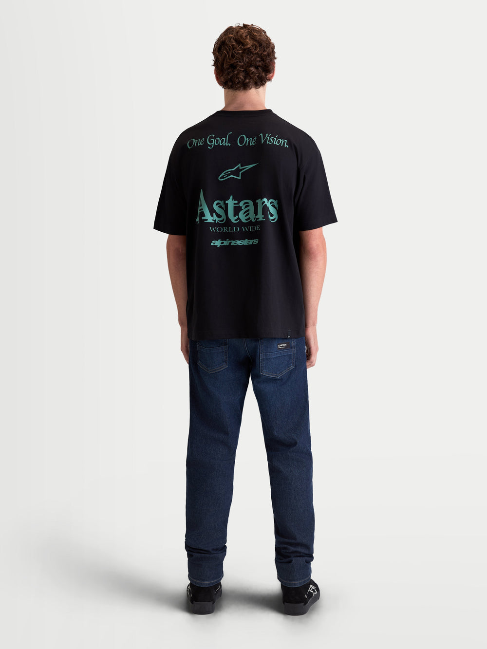 Alpinestars Post Oversized CSF Tee, Men's Oversized Sportswear T-Shirt, Black with Teal Graphics, features One Goal. One Vision. and Astars World Wide back graphics, soft cotton blend, relaxed fit for everyday comfort.