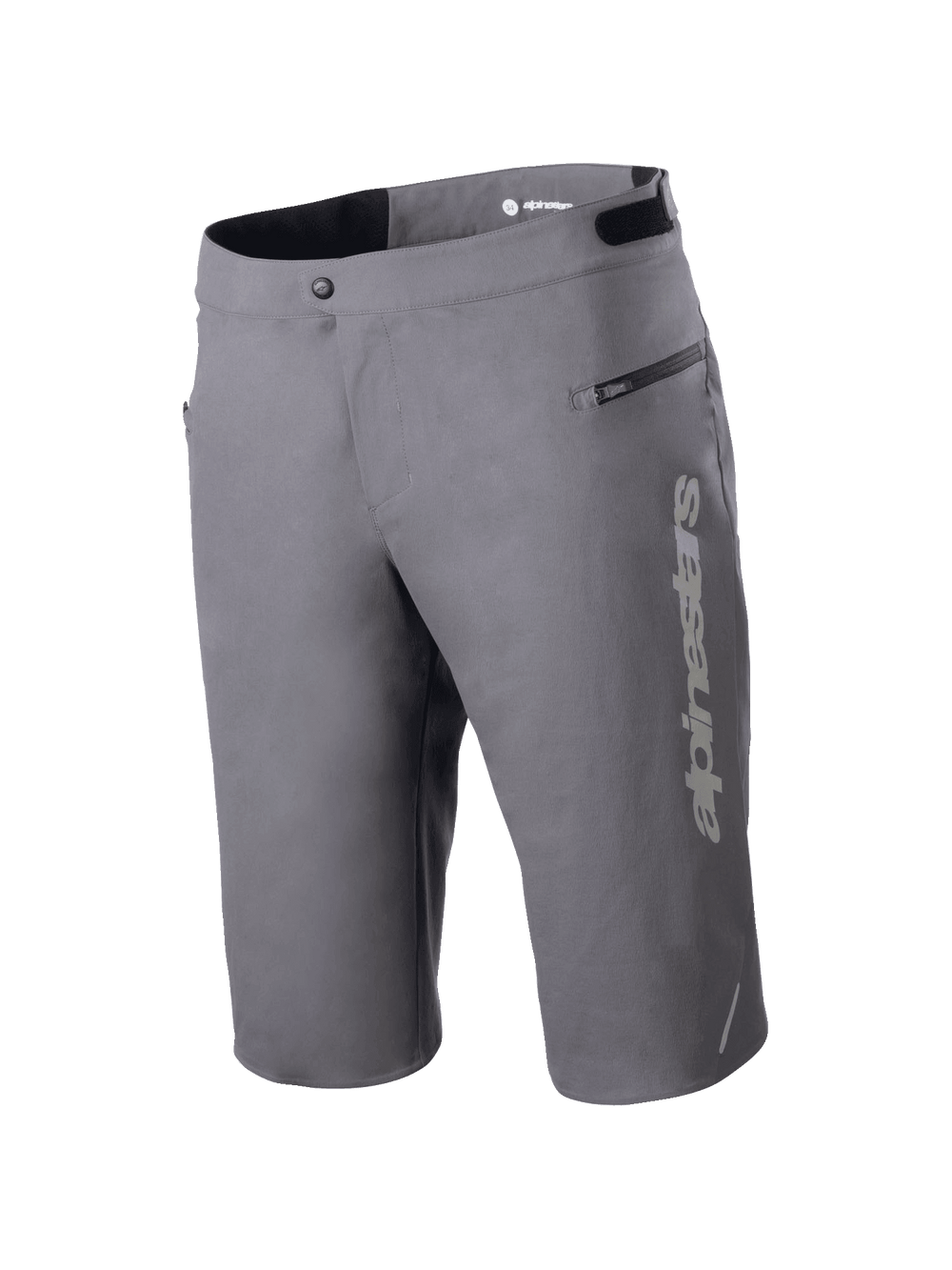 Alpinestars A-Dura Elite Shorts, Mountain Bike Shorts, Dark Gray, featuring a vertical Alpinestars logo on the leg, zippered side pocket, front snap closure, and adjustable waist tabs for off-road cycling.