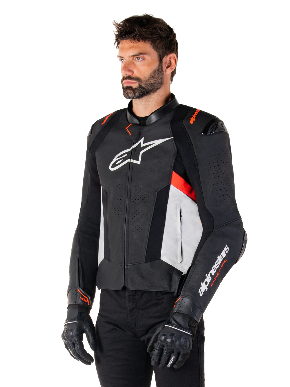 Alpinestars Missile V3 Leather Jacket, Black White and Red Fluo, racing sport motorcycle jacket worn by a model with black gloves and pants, featuring perforated leather panels and bold Alpinestars branding