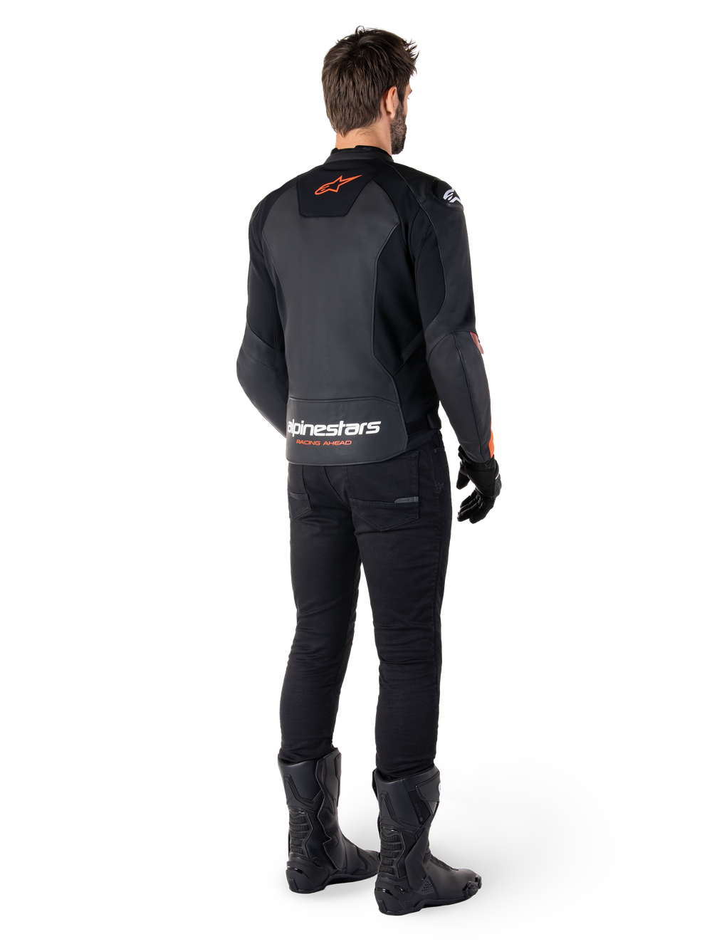 Alpinestars Faster V3 Leather Jacket, Sport Motorcycle Jacket, Black and Red Fluo, rear view worn with black pants and black boots, featuring 'alpinestars RACING AHEAD' text on the lower back and a small red star logo, sleek sport-fit leather construction