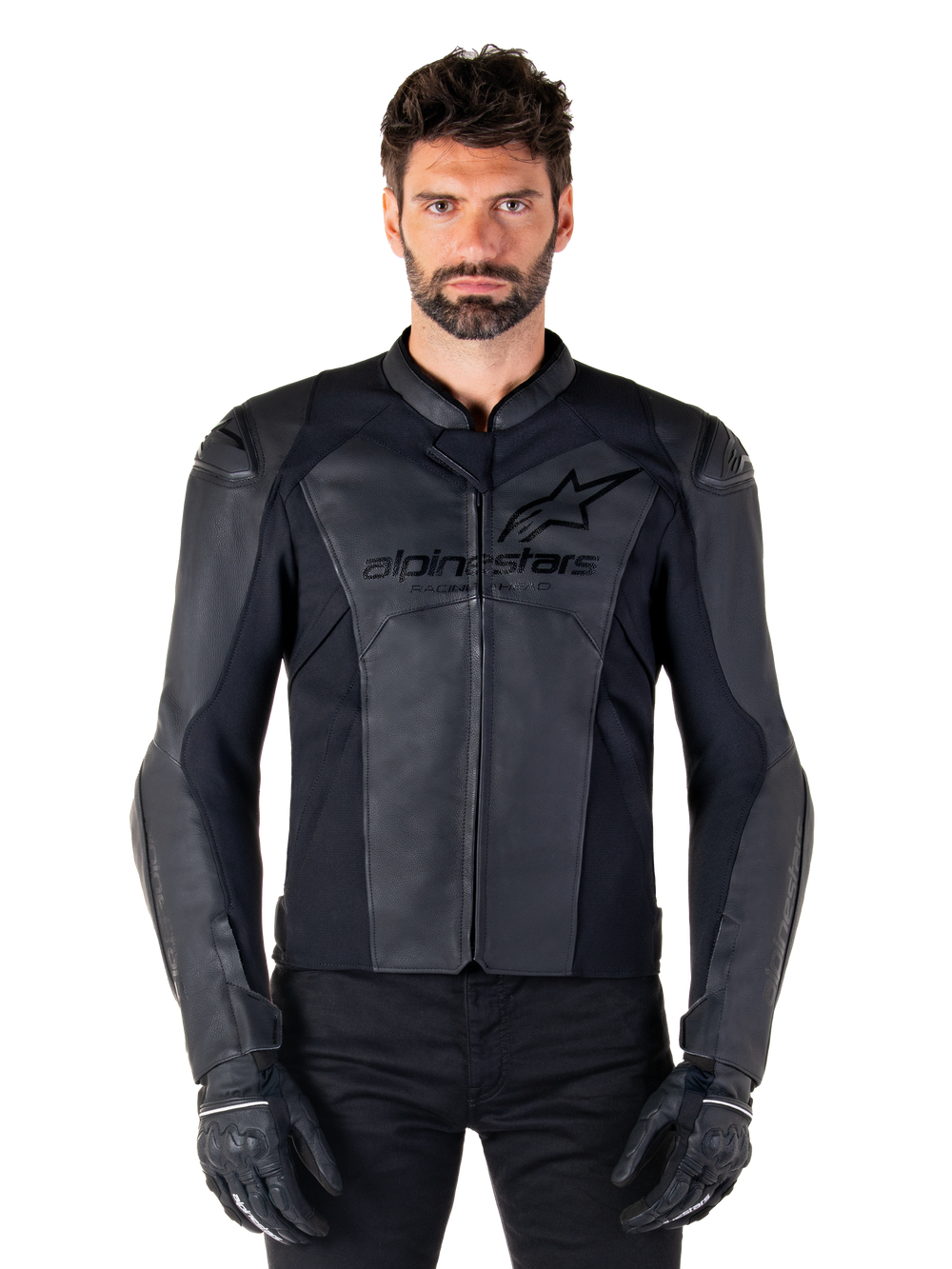 Alpinestars Faster V3 Leather Jacket, Black Motorcycle Jacket, premium leather with HRSF stretch panels, sleek sport fit, reinforced shoulders with protectors, worn with black gloves, professional gear for road riding