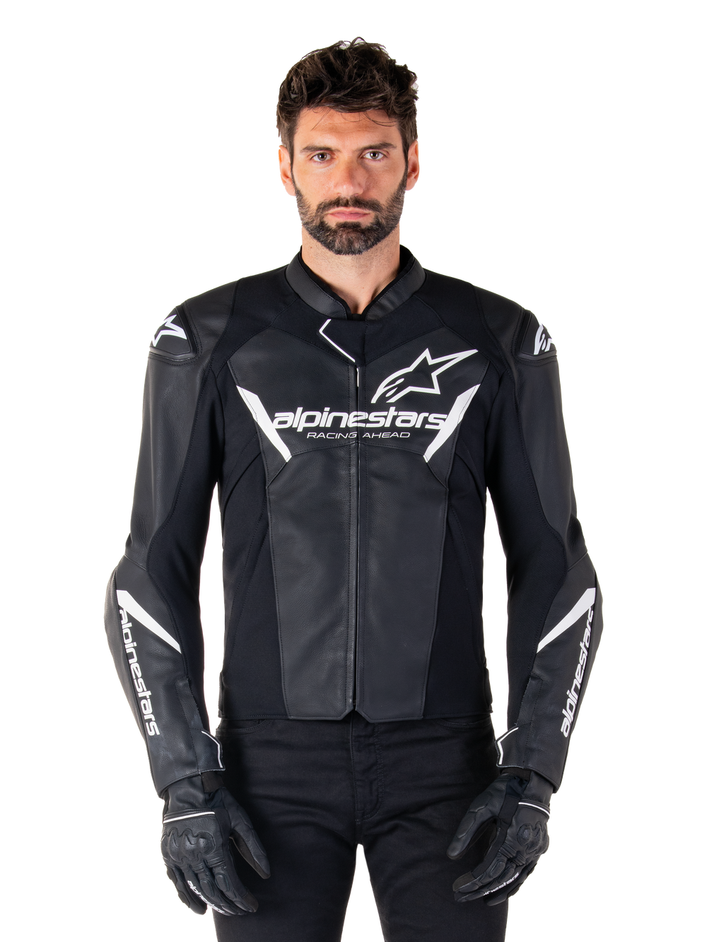 Alpinestars Faster V3 Leather Jacket, Black and White Motorcycle Racing Jacket, featuring bold white logos and 'Racing Ahead' chest text, sleek leather design with angular accents on sleeves, worn with black racing gloves