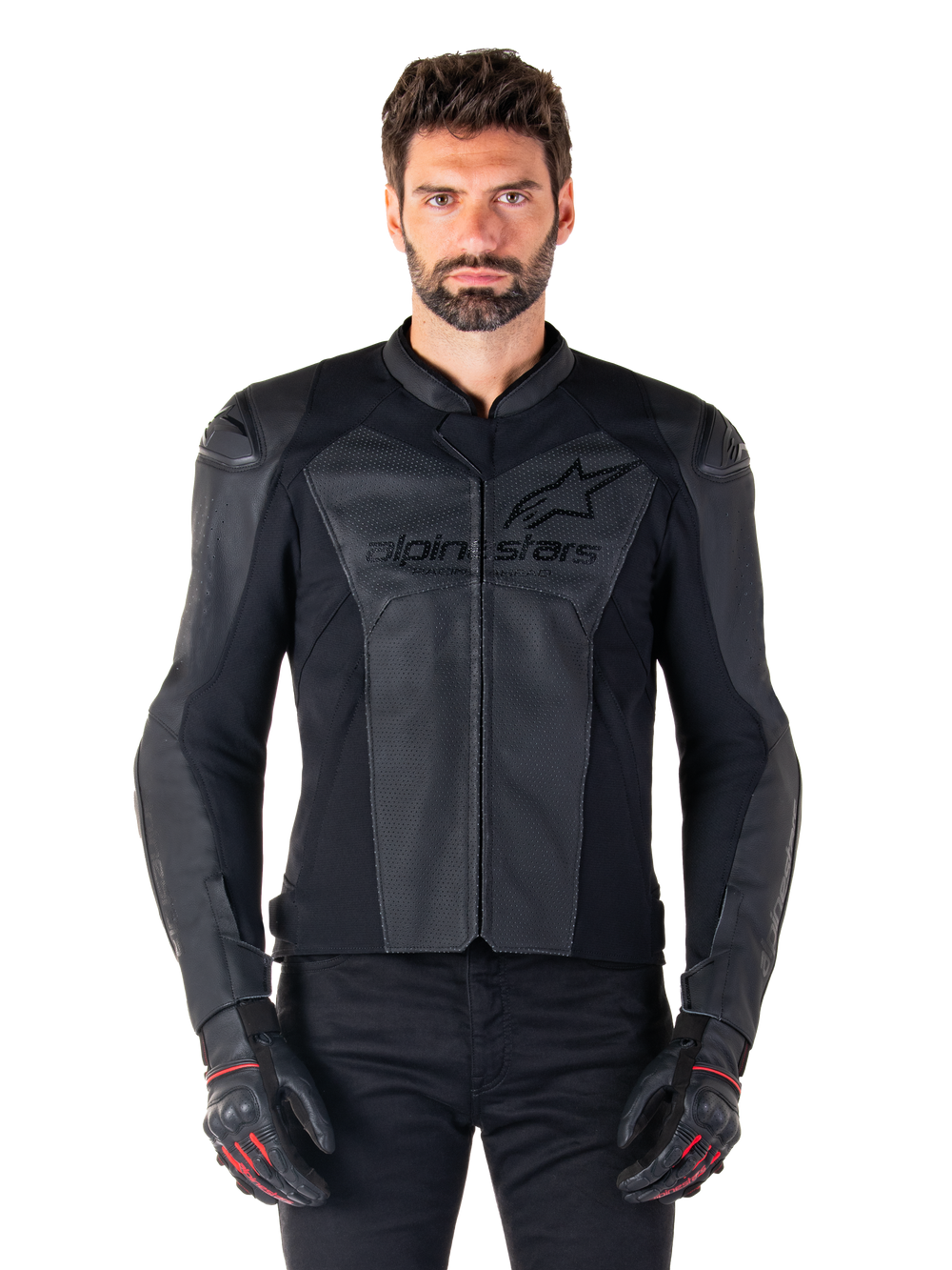 Man wearing Alpinestars Faster V3 Airflow Leather Jacket, Black motorcycle racing jacket with perforated leather panels, featuring Alpinestars logo on the chest, paired with black riding gloves, front-facing studio shot.