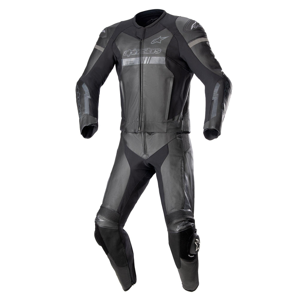 Black and gray motorcycle racing suit with reinforced shoulder, elbow, and knee protection, front zipper, aerodynamic design, padded impact zones, professional motorsport gear