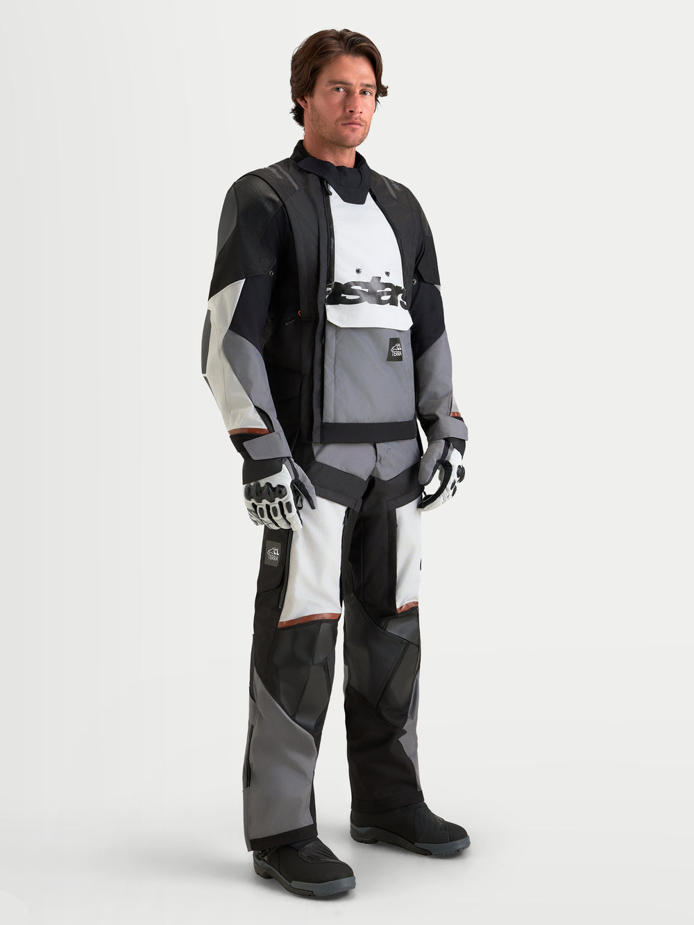 Alpinestars Harok V2 Drystar Jacket, Men's adventure motorcycle jacket in dark gray, ice gray, and black, featuring CE-certified protection and waterproof modular construction worn by a model