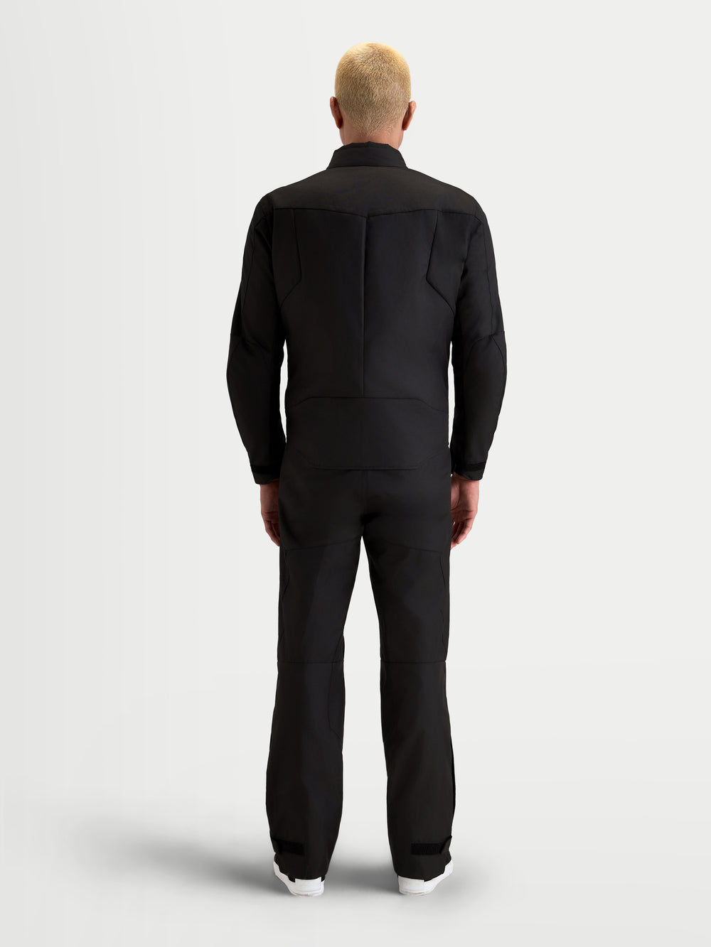 Alpinestars C-1 Waterproof Jacket, men's urban contemporary motorcycle textile jacket in black, rear view on a model showing the ergonomic 3D back pattern and polyfabric construction.
