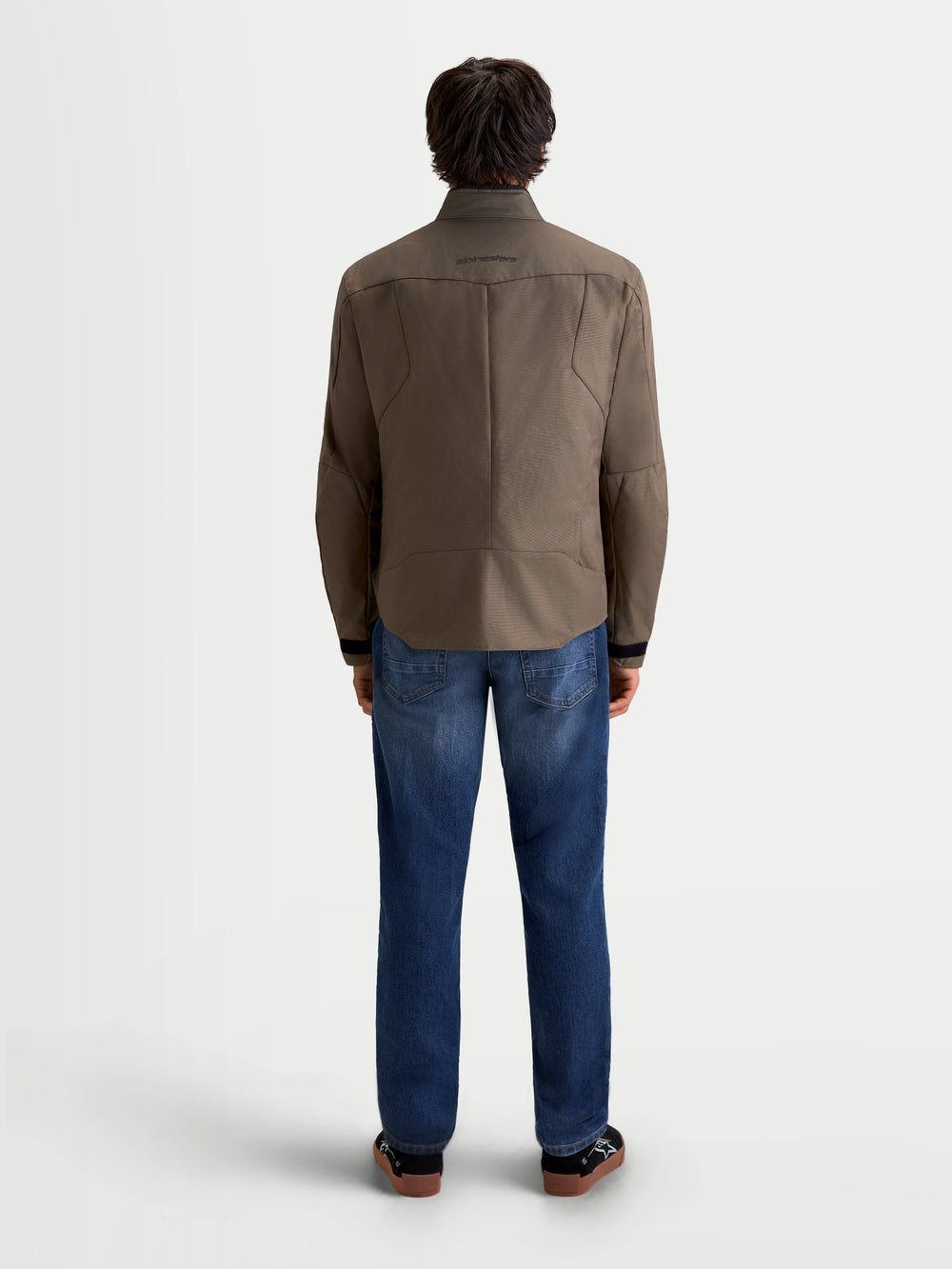 Alpinestars C-1 Waterproof Jacket, men's urban contemporary motorcycle textile jacket in walnut black, rear view on a model wearing jeans, showing 450D polyfabric construction and 3D back pattern