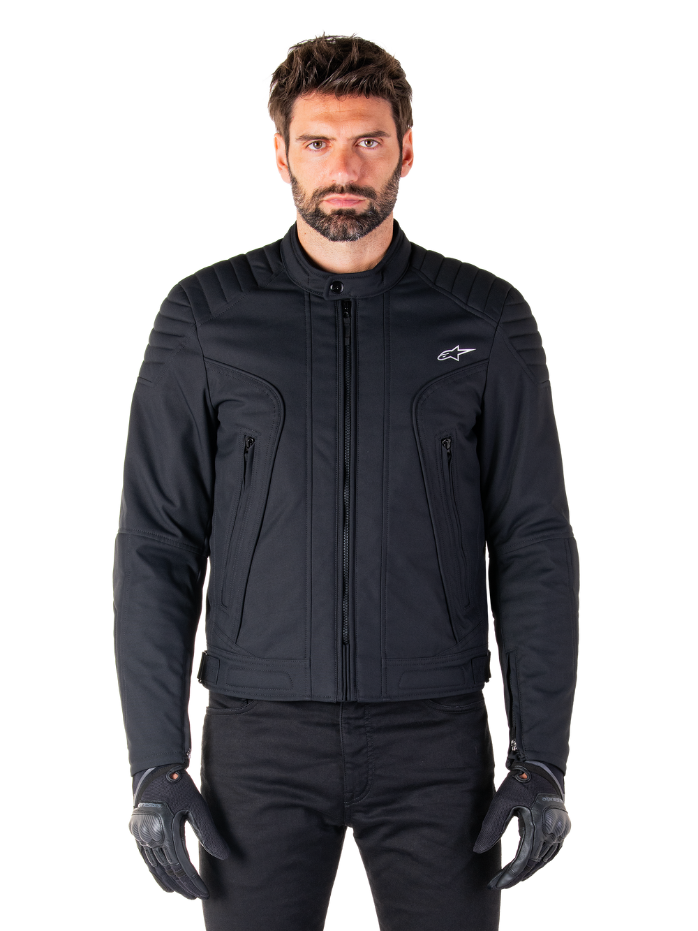 Alpinestars Clayton WR Jacket, Black Motorcycle Jacket, worn by model, featuring quilted shoulder details and technical graphics, central Vislon zipper, vertical zippered pockets, small white logo on chest, urban riding gear for road use