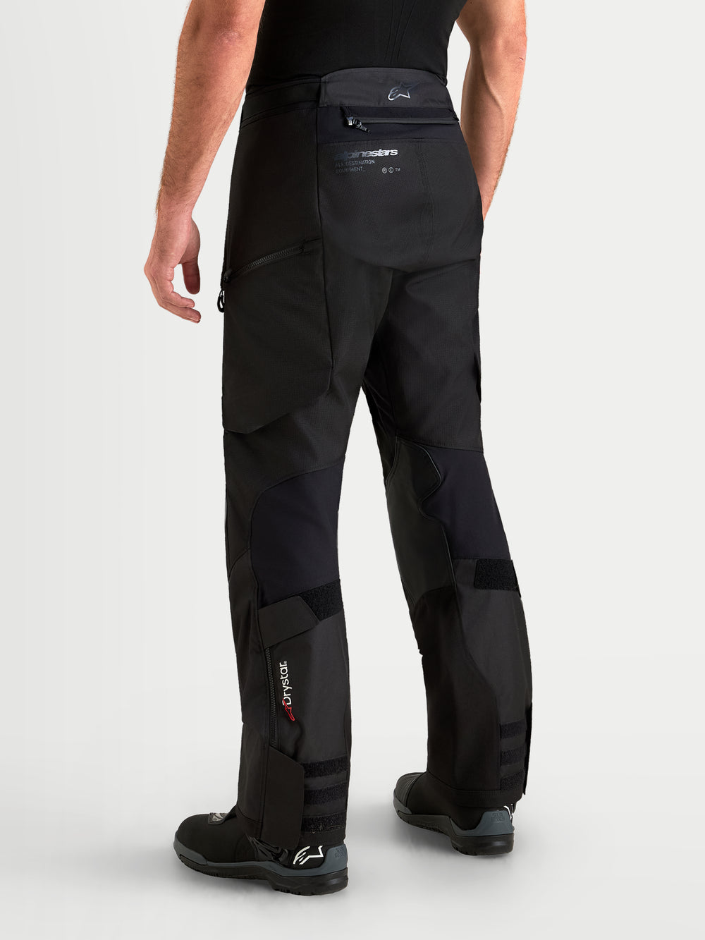 Alpinestars Harok V2 Drystar Pants, Men's Black adventure motorcycle pants, rear view showing durable ripstop construction, Drystar branding on lower leg, and over-the-boot design