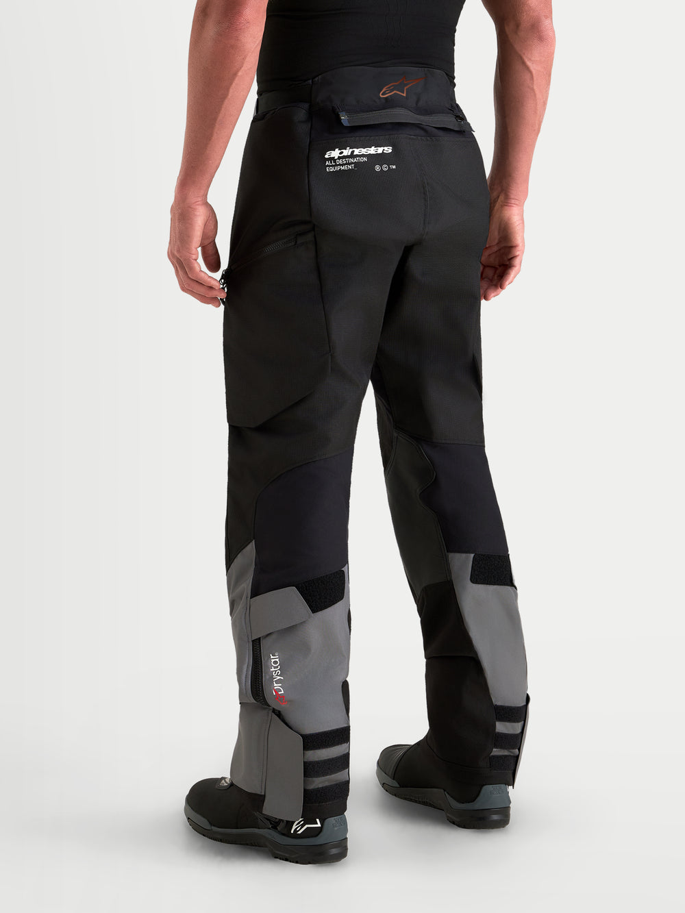 Alpinestars Harok V2 Drystar Pants, Men's adventure motorcycle pants in dark gray and black, featuring ripstop construction, waterproof Drystar membrane, and over-the-boot design, rear view