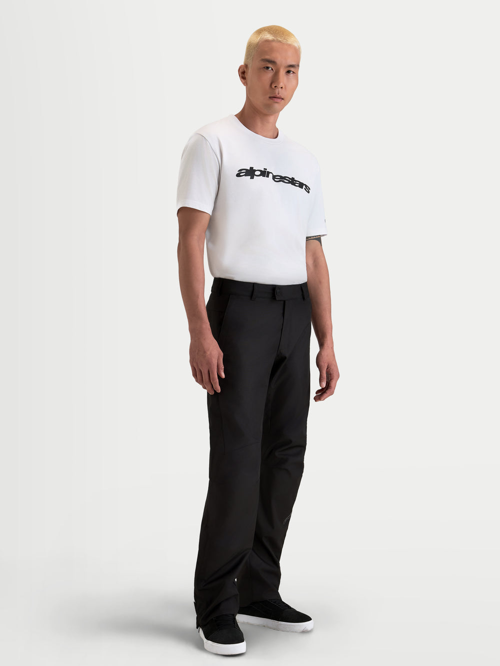 Alpinestars C-1 Waterproof Pants, men's waterproof motorcycle pants in black, straight-fit winter touring apparel worn by a model.