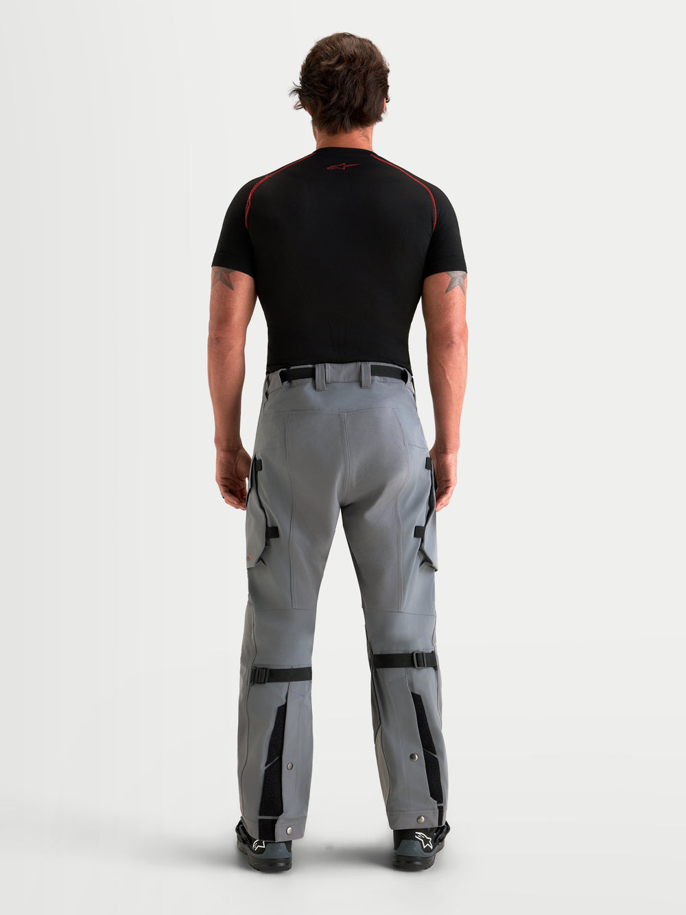 Alpinestars Maxdura Drystar XF Laminated Pants, Men's Adventure Motorcycle Pants in Dark Gray, rear view showing waterproof textile construction, integrated waist belt, and adjustable lower legs