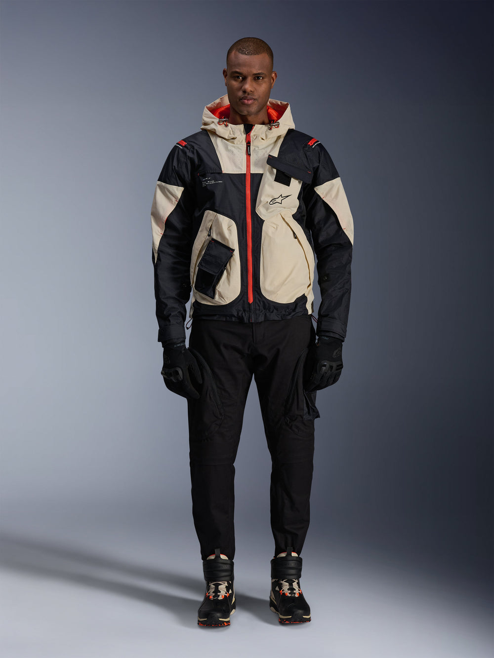Alpinestars Mogress Air Jacket, men's urban textile motorcycle jacket in black and almond with hot orange accents.