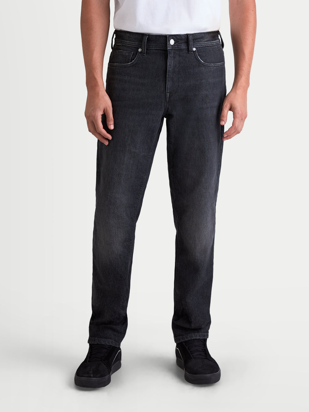 Alpinestars Flex-AST 8 Denim Pants Short, men's urban motorcycle riding jeans in used black, straight-leg fit worn by a model, AA certified technical denim with stretch comfort