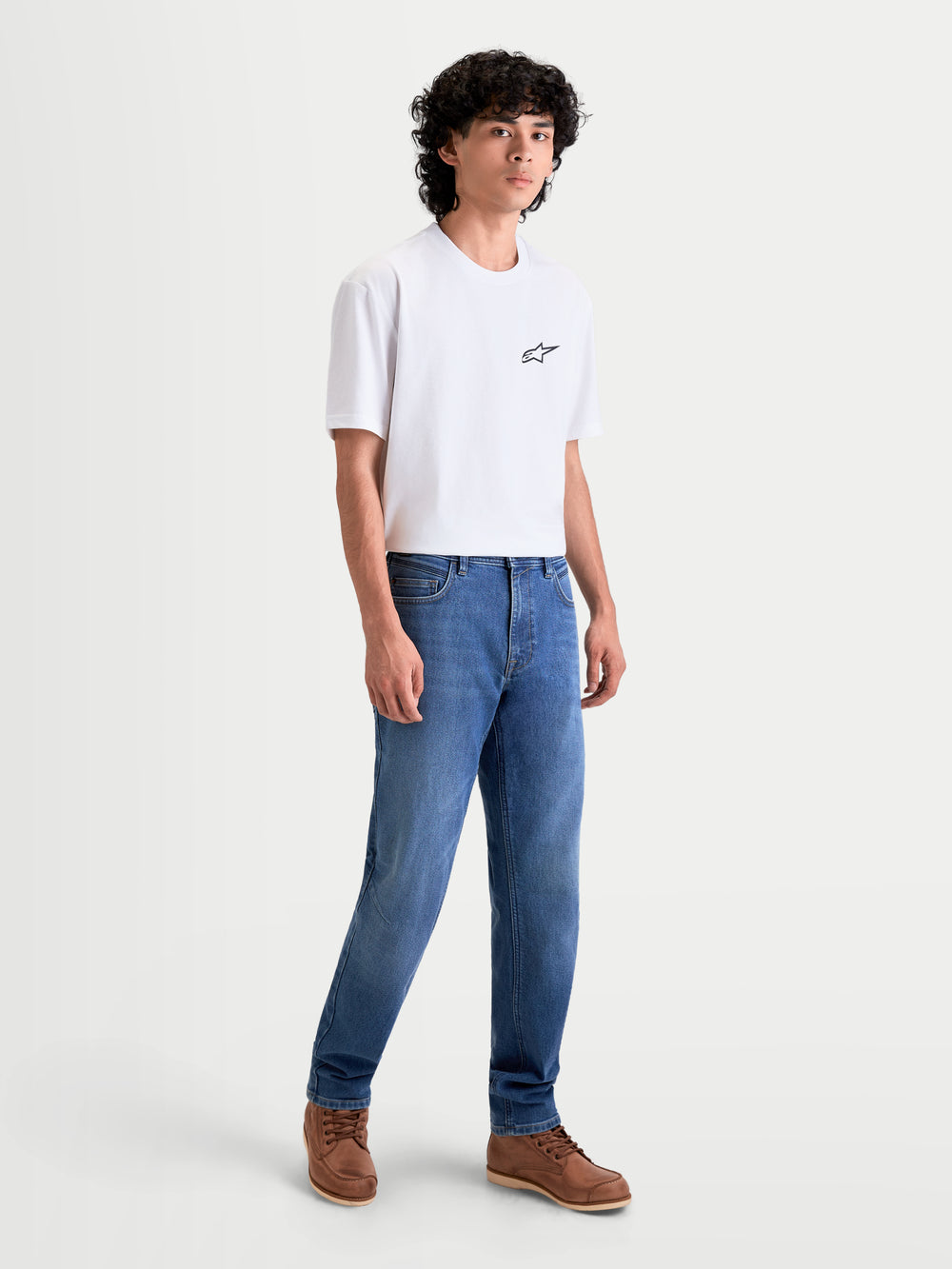 Alpinestars Flex-AST 7 Denim Pants Short, men's urban motorcycle riding jeans in light blue, front full-length view on a model wearing casual apparel, AA certified technical denim with single-layer construction.