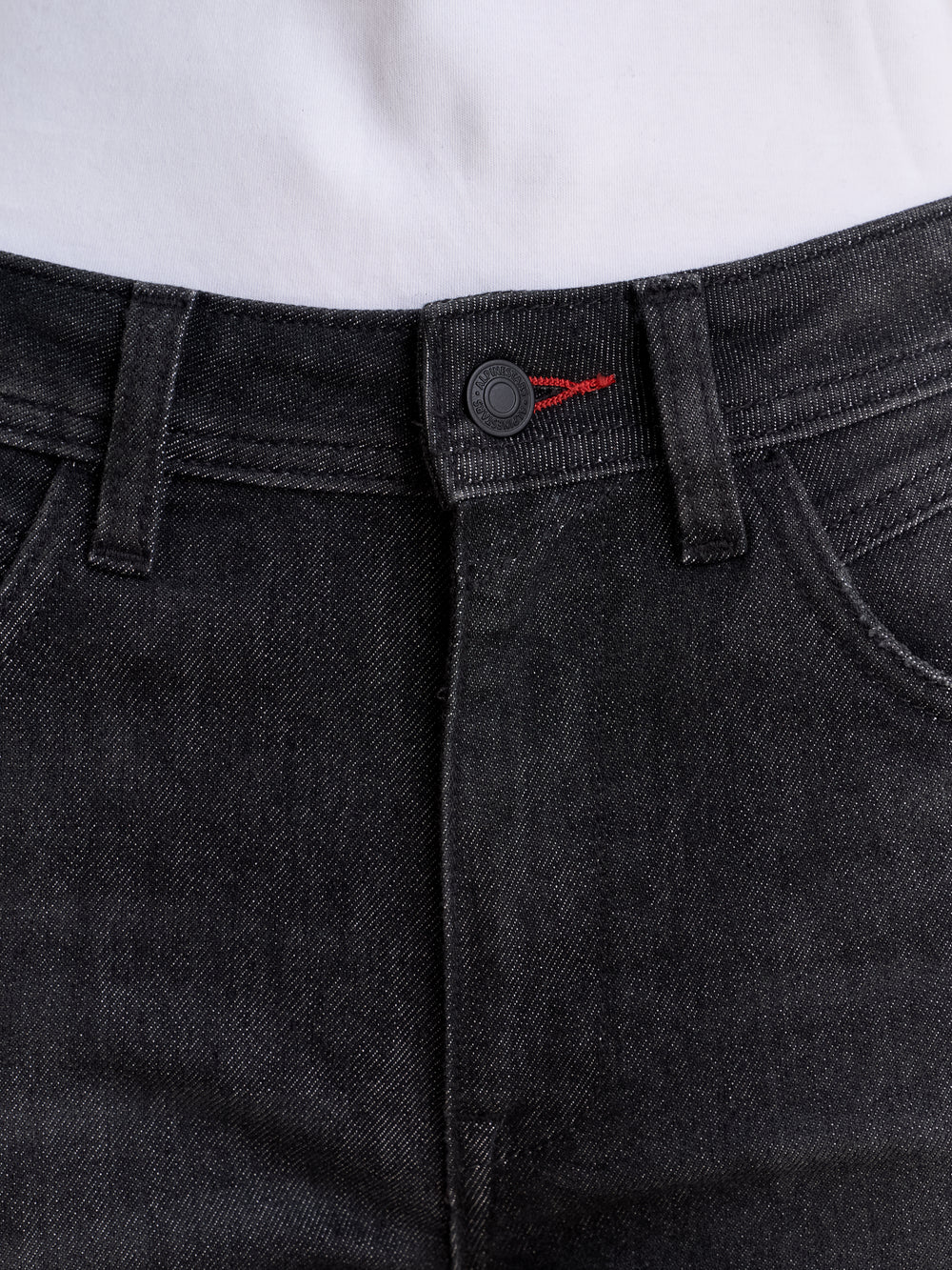 Alpinestars Stella Flex-AST 7 Denim Pants, women's motorcycle riding jeans in faded black, close-up view of the waistband and branded button closure with red contrast stitching details