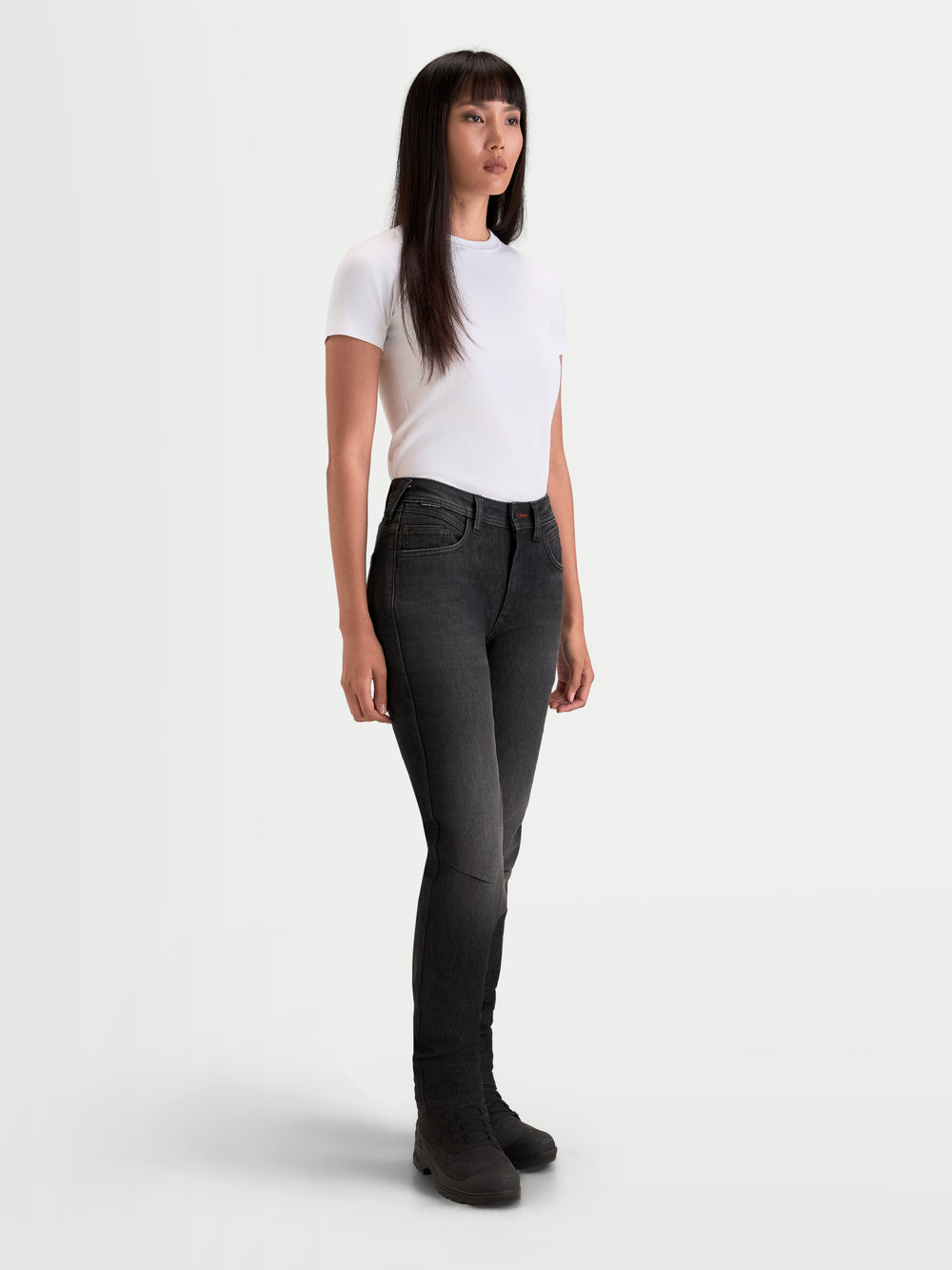 Alpinestars Stella Flex-AST 7 Denim Pants, women's urban contemporary motorcycle riding pants in faded black, worn by a model showcasing a single-layer AA-rated denim construction and slim-profile protection