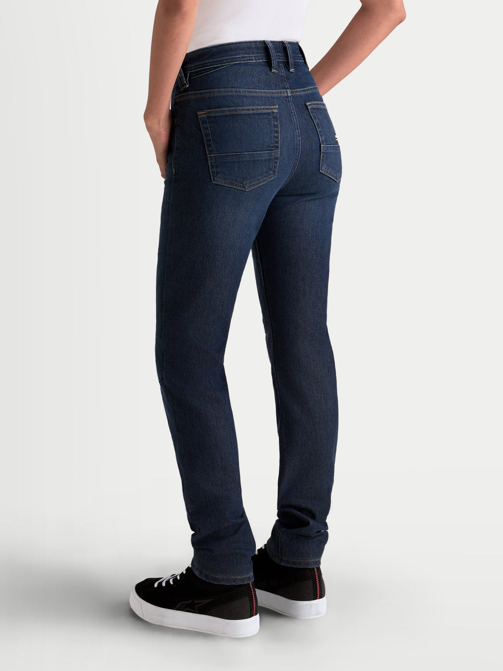 Alpinestars Stella Flex-AST 7 Denim Pants, women's urban motorcycle riding jeans in dark blue, rear view showing single-layer technical denim construction and five-pocket styling on a model