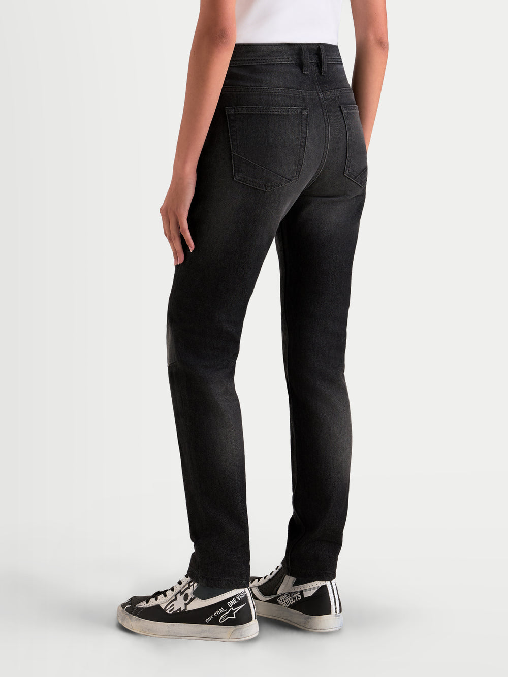 Alpinestars Stella Flex-AST 5 Denim Pants, women's urban motorcycle denim pants in black washed, rear view showing single-layer stretch construction and ergonomic fit on a model