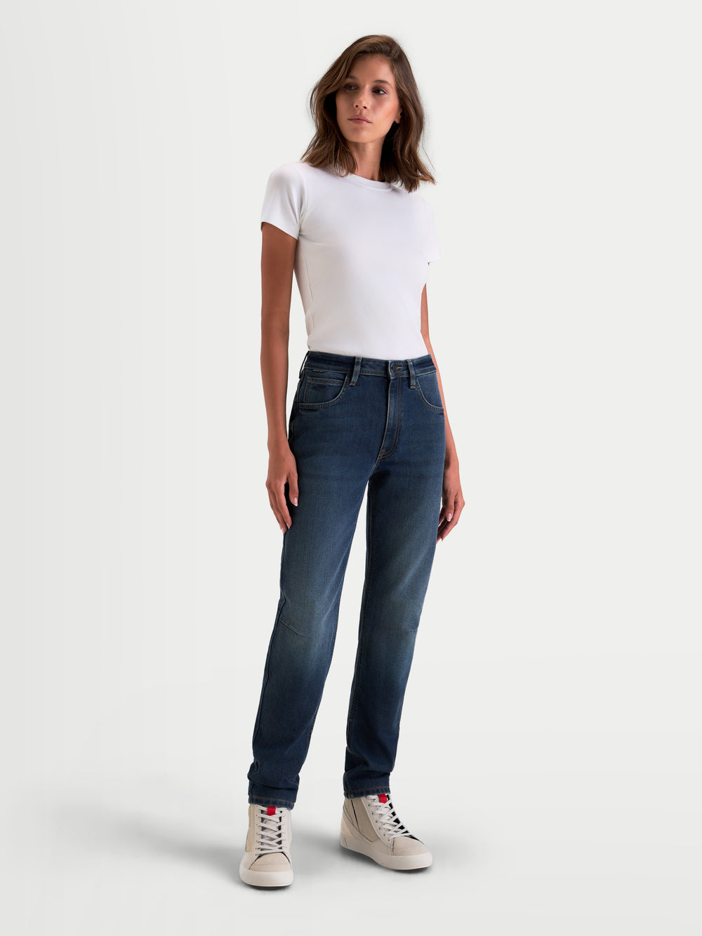 Alpinestars Stella Flex-AST 5 Denim Pants, women's urban motorcycle denim pants in indigo washed, full-length front view on a model wearing a white t-shirt and light sneakers, CE A certified riding jeans with low-bulk comfort
