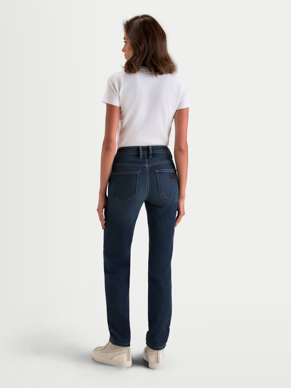 Alpinestars Stella Flex-AST 5 Denim Pants, women's urban motorcycle jeans in indigo washed, rear view showing single-layer stretch denim construction and raised back waistband on a model