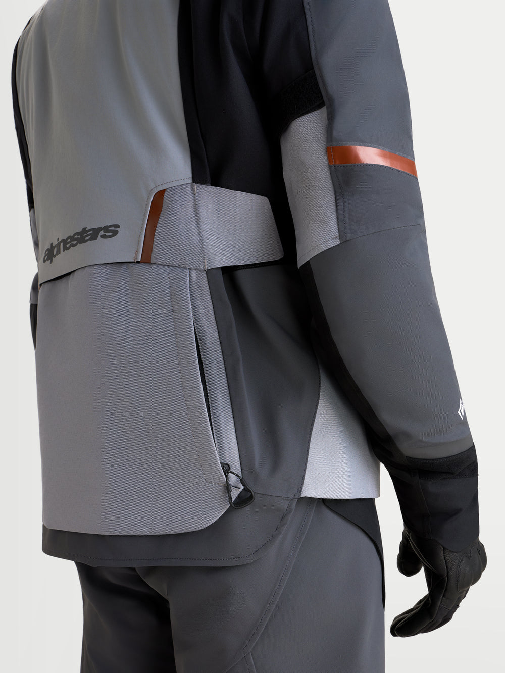Alpinestars St-7 V2 2L Gore-Tex Jacket, Men's adventure touring motorcycle jacket, mid gray, deep gray and black, rear view showing technical details, waterproof storage, and ergonomic panel construction