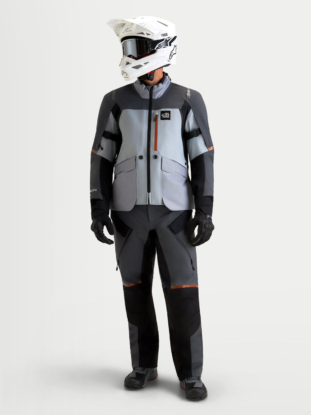 Alpinestars St-7 V2 2L Gore-Tex Jacket, Men's Adventure Touring Motorcycle Jacket in Mid Gray and Deep Gray, featuring waterproof GORE-TEX construction and CE-certified protection worn by a model