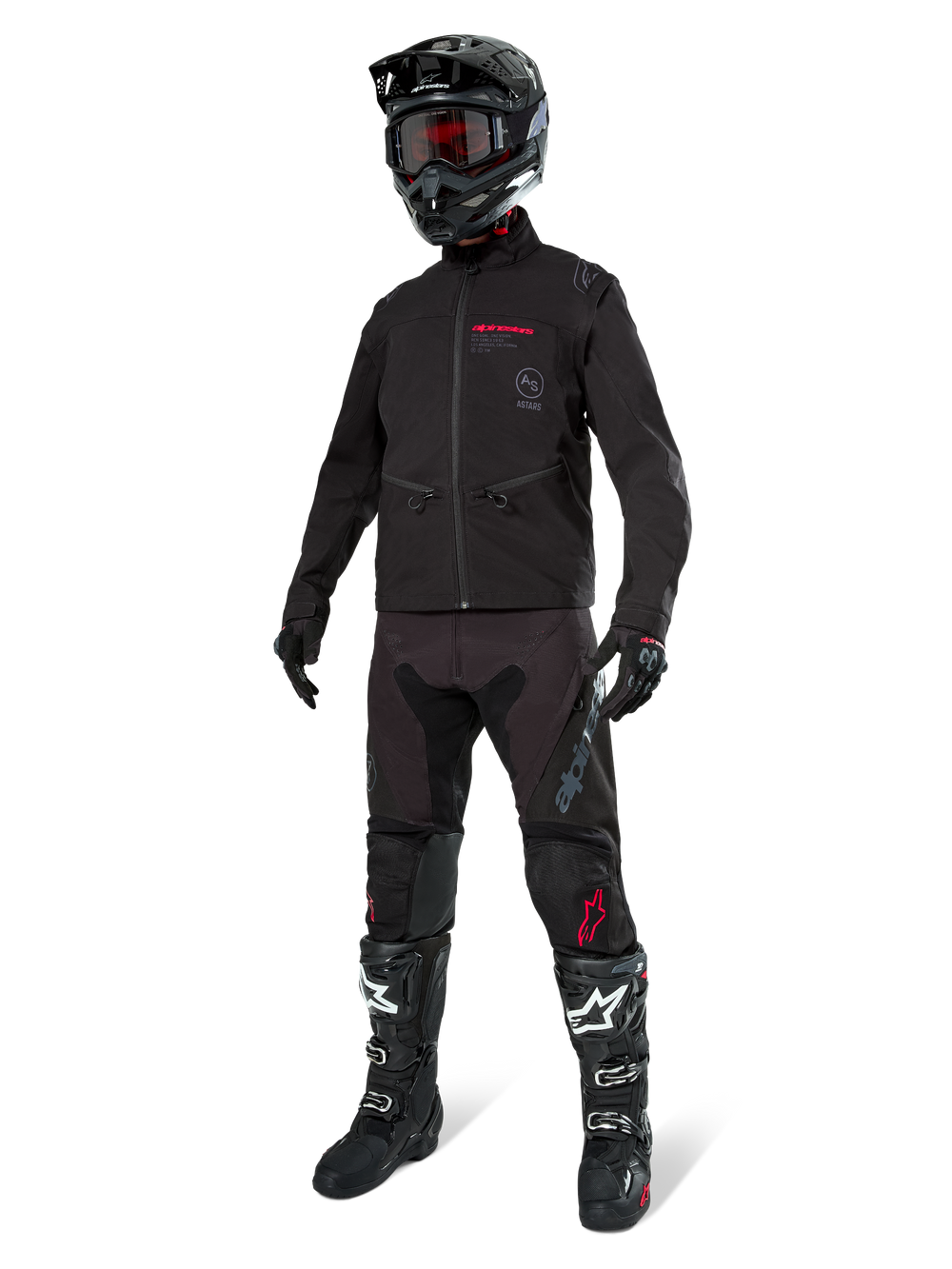 Alpinestars Lite-Dura Softshell Jacket, Black, worn by a mannequin as part of a complete off-road gear set including black pants, black and white boots, black helmet with red goggles, professional motocross and enduro apparel.