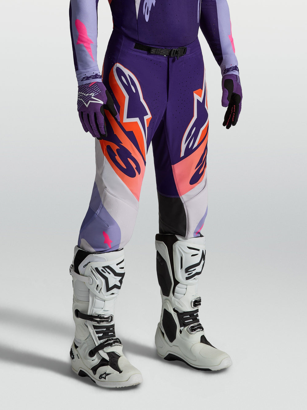 Alpinestars Supertech Dyna Motocross Pants in purple and pink fluo, featuring a performance athletic race fit.