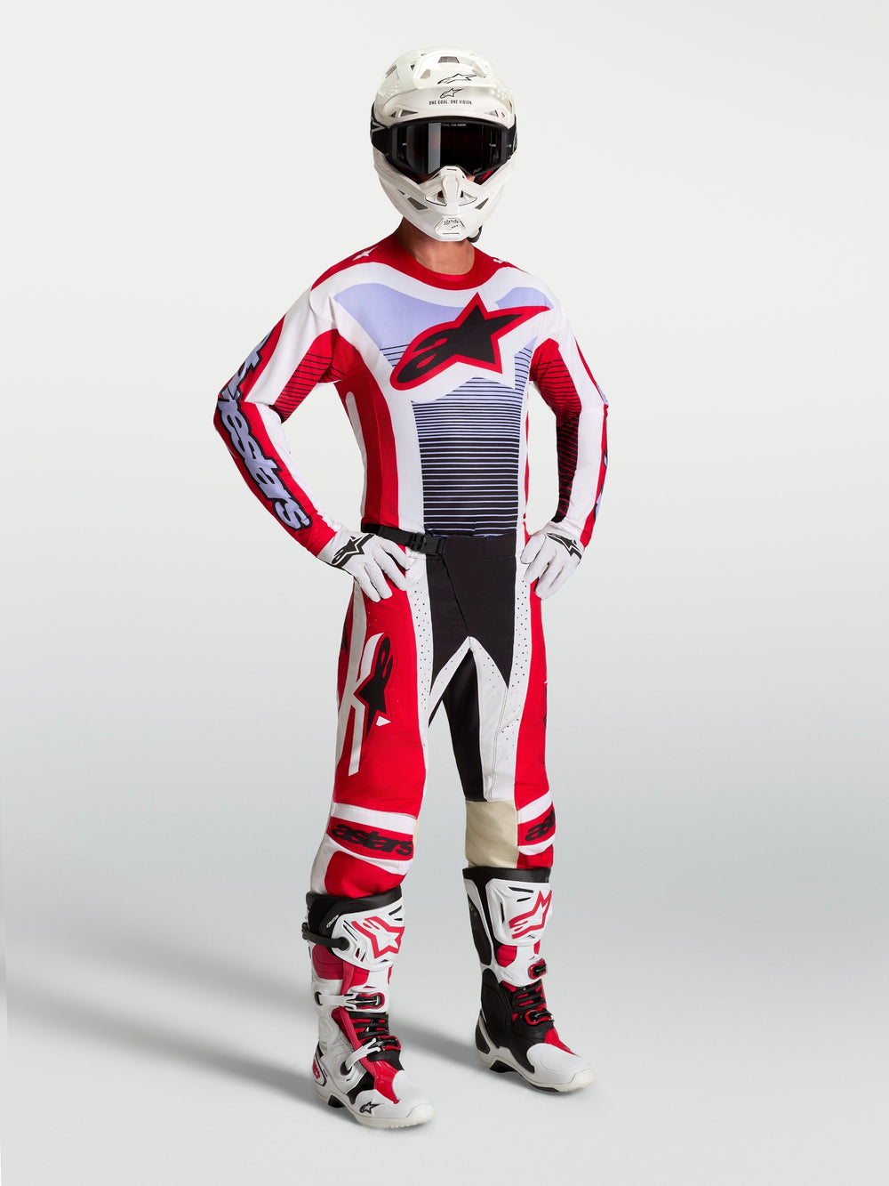Alpinestars Techstar Maven Pants, fire red and white motocross racing gear set with matching jersey and boots.