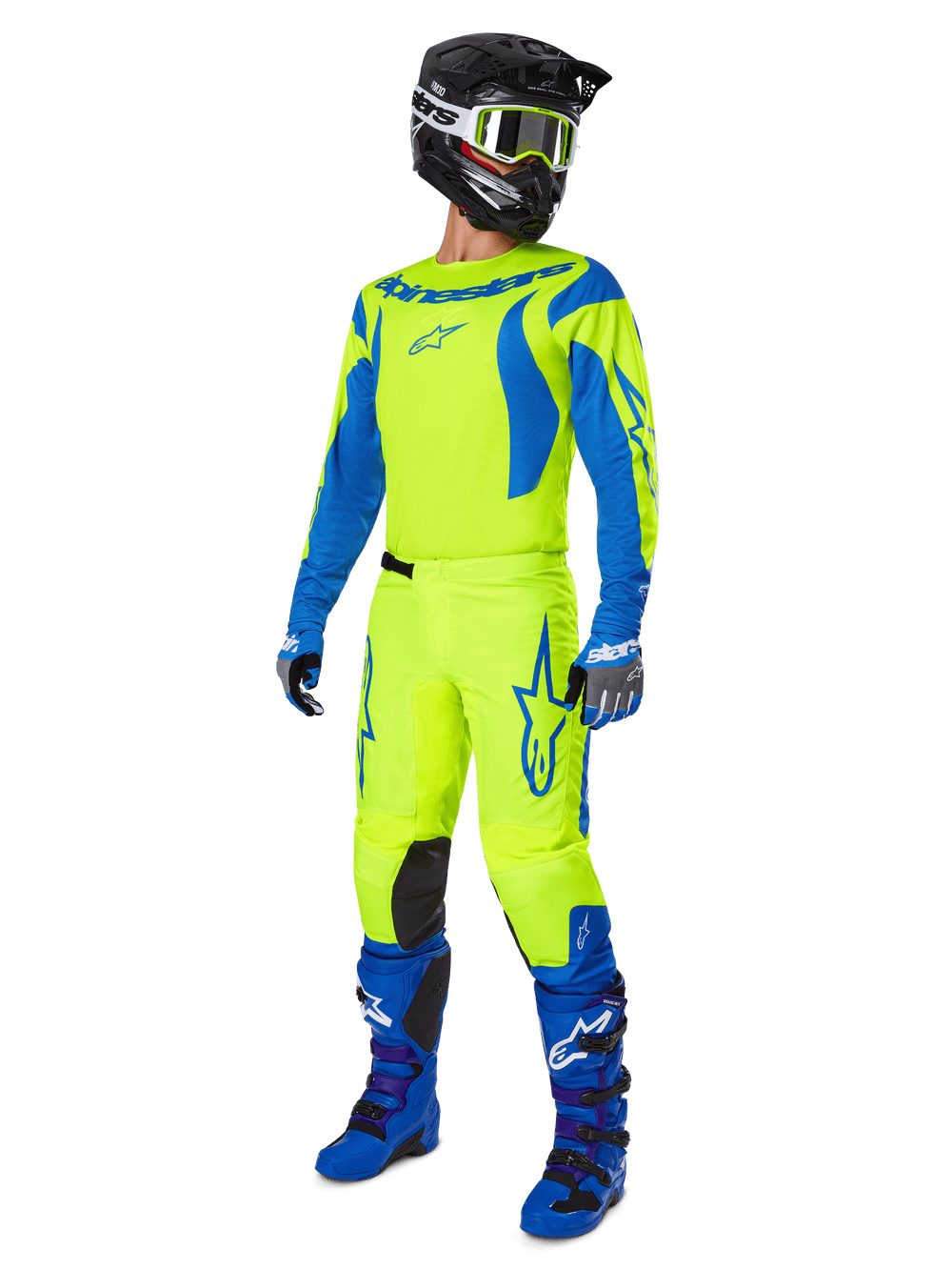 Alpinestars 2025 Fluid Haul Pants, Motocross Pants, Bright Yellow Fluo and Blue, worn as part of a complete racing gear set with matching jersey, blue boots, and a black helmet, high-visibility design for off-road riding.
