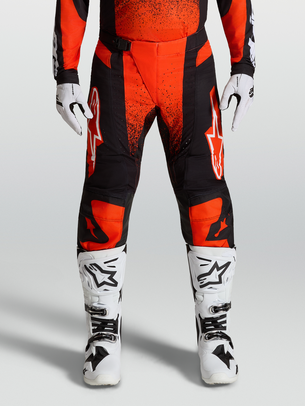 Alpinestars Techstar Swan Motocross Pants, Cardinal Red and Black, Cardinal Red with white race boots and gloves.