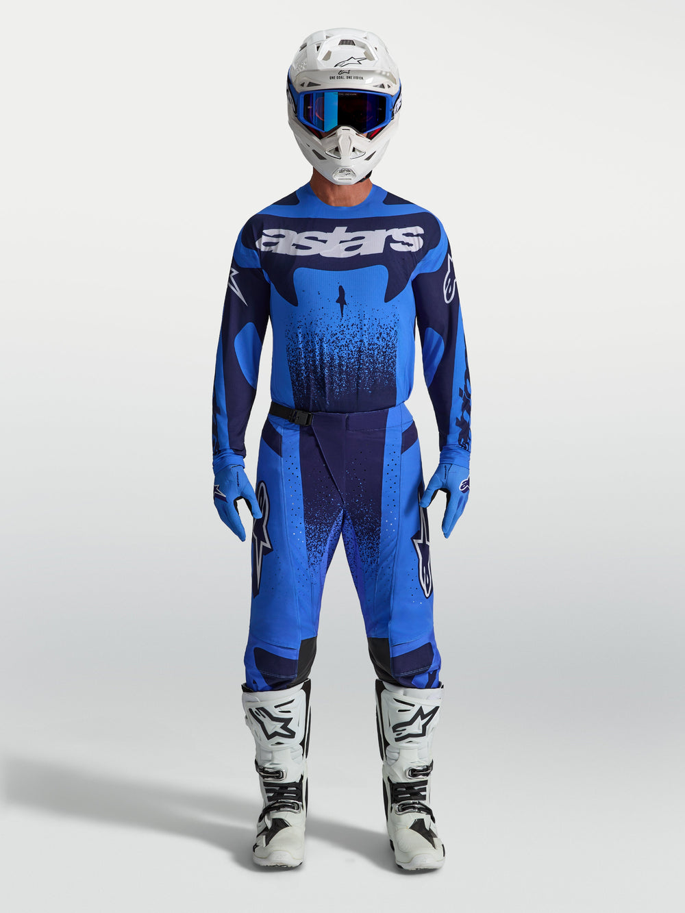 Alpinestars 2027 Techstar Swan Pants, Men's Motocross Gear in Blue, worn with matching jersey, white helmet and boots.