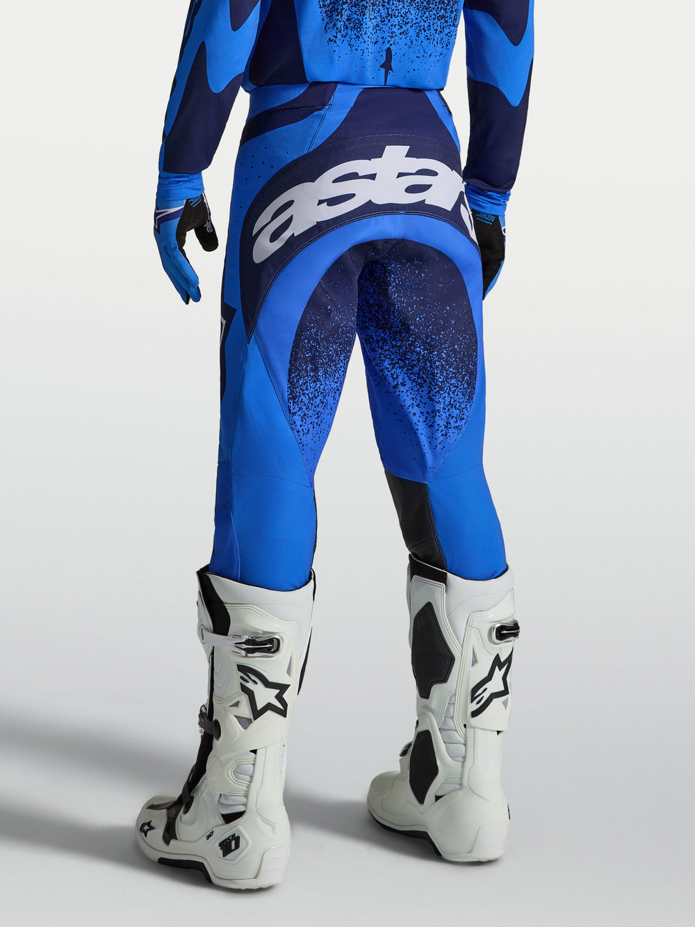 Alpinestars Techstar Swan Pants, Motocross Racing Pants for Men, Ucla Blue and Deep Blue, with large white seat logo.