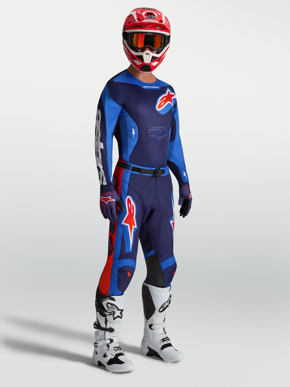 Alpinestars Racer Hunt Pants, blue and red motocross gear for men, featuring an ergonomic pre-curved race fit.