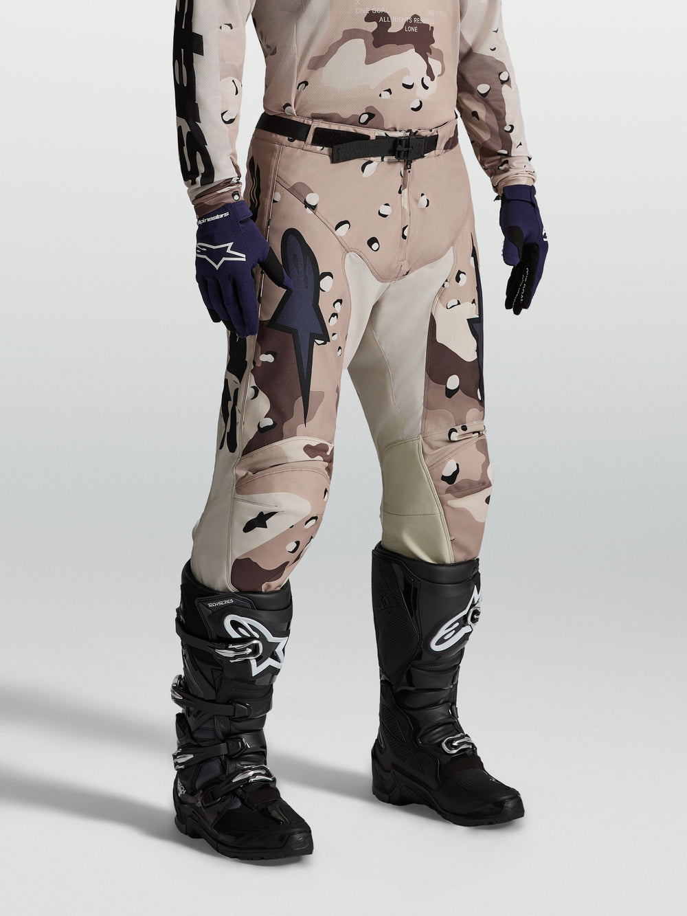 Alpinestars Racer Lone Pants, men's motocross gear in Desert Camo, featuring 600D polyfabric and leather inner knee panels.