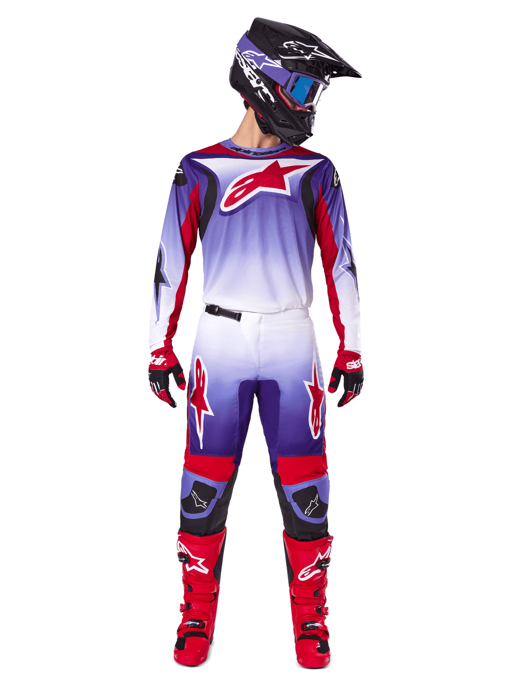 Alpinestars 2025 Fluid Wurx Gear Set, Motocross rider in purple, white, and bright red jersey and pants, black helmet with blue goggles, red motocross boots and matching gloves, athletic racing design for off-road performance