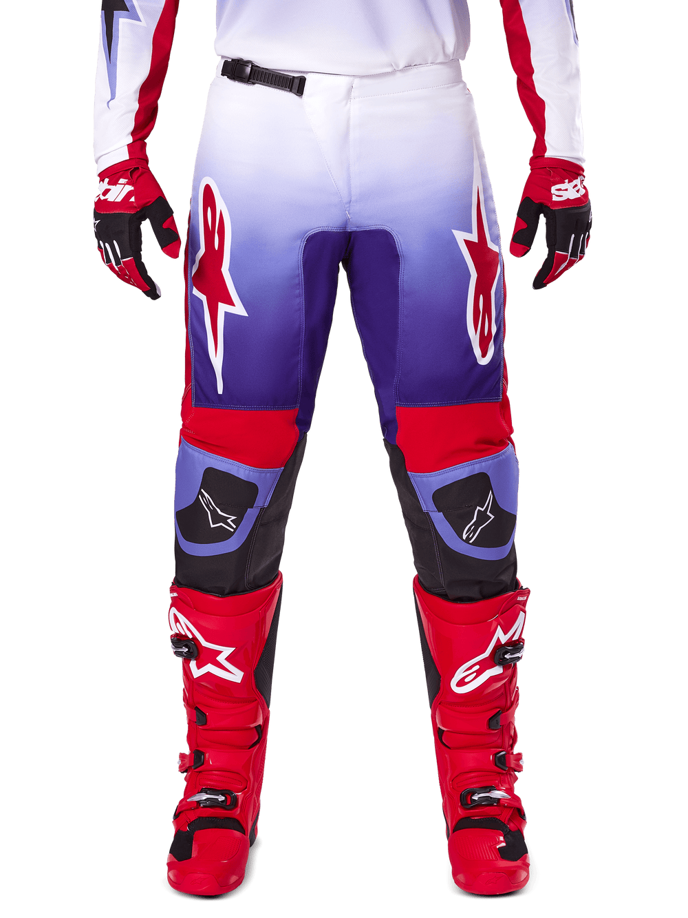 Alpinestars 2025 Fluid Wurx Pants, Motocross Pants, Purple and Bright Red, worn with matching red boots and gloves, featuring white logos on the thighs and black knee reinforcements, performance gear for off-road riding