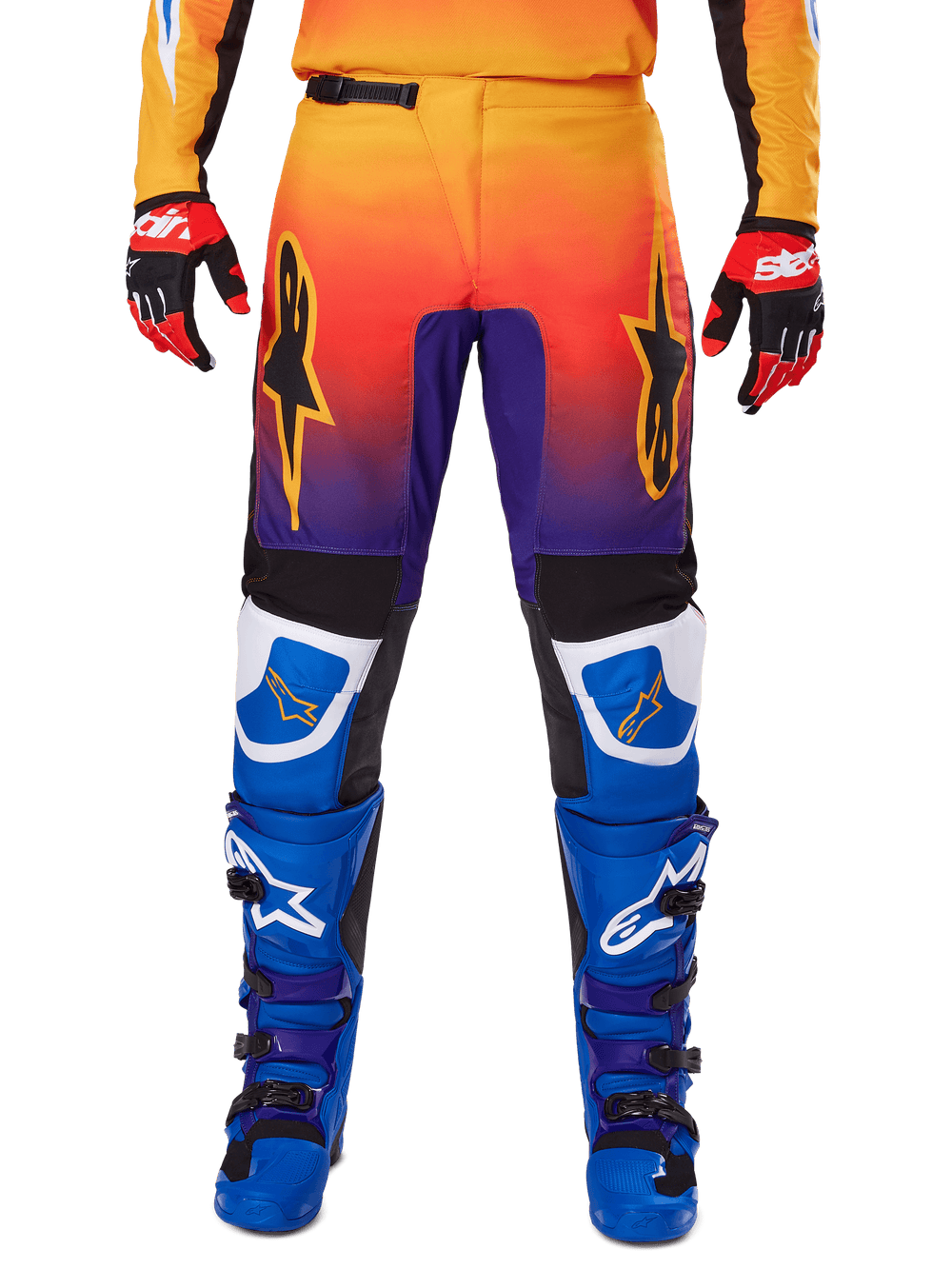 Alpinestars 2025 Fluid Wurx Pants, Motocross Pants, Multicolor featuring orange-to-purple gradient and blue panels, worn with matching blue and purple boots and red and black gloves, front view with star logo branding.