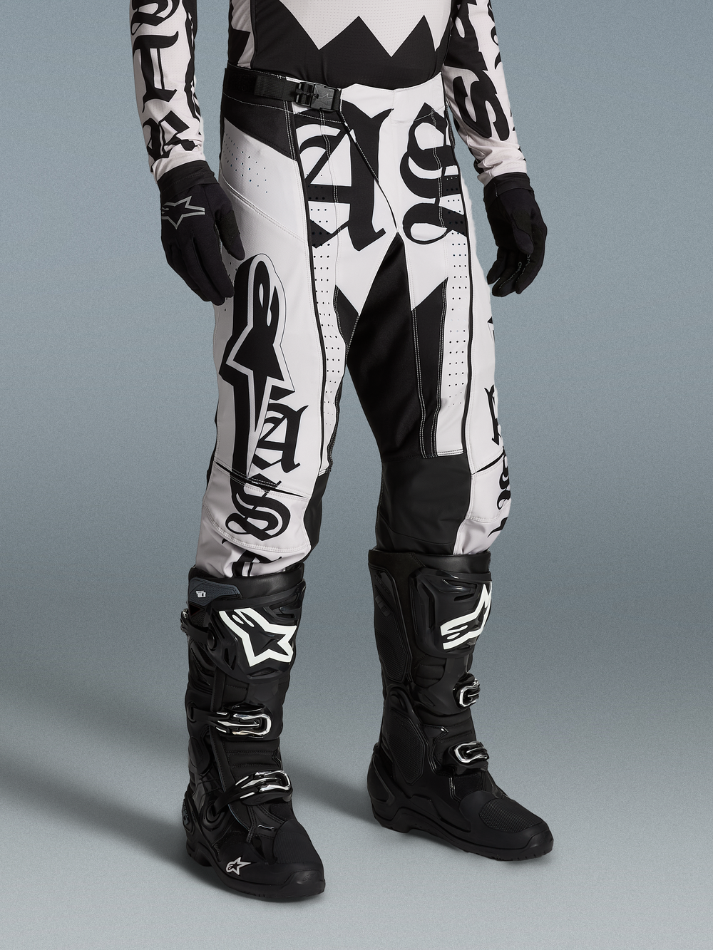 Alpinestars Limited Edition Techstar Wolf Dust Pants, black and white motocross gear with graphic print and athletic fit.
