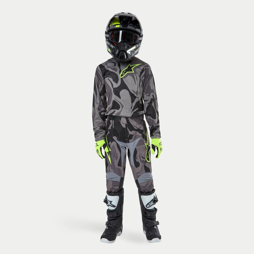 Alpinestars Youth 2024 Racer Tactical Pants, Gray Camo and Neon Motocross Gear, featuring pre-curved legs and leather knees.